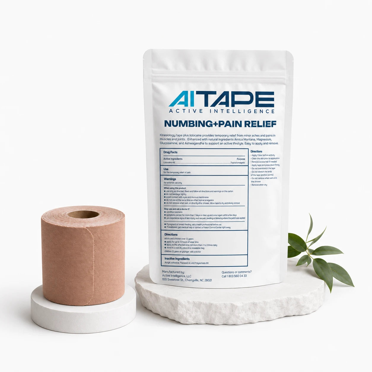 Back view of AITAPE Active Intelligence Numbing and Pain Relief Kinesiology Tape infused with Arnica and Magnesium, shown next to a beige elastic tape roll.